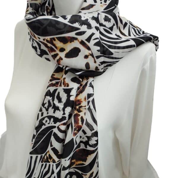 Silk Scarf ANIMAL PRINT Composition: Silk100% Colour: Blacknwhite Dimensions: 50cm x1,60cm Care: Dry Clean